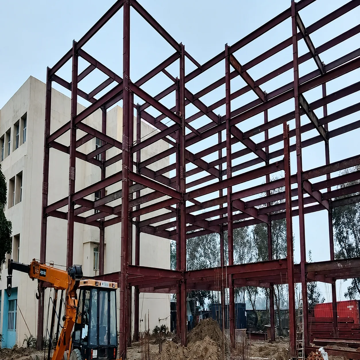 PEB structural frame under construction at GITAM College in Kablana